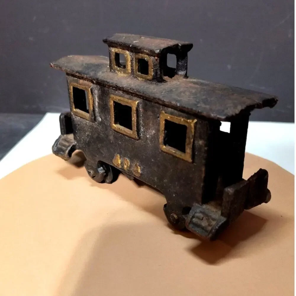 586. Vintage Cast Iron Caboose #404 Train piece